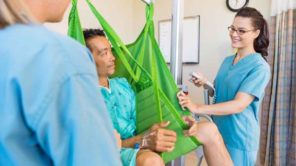 Healthcare worker demonstrating proper lifting techniques